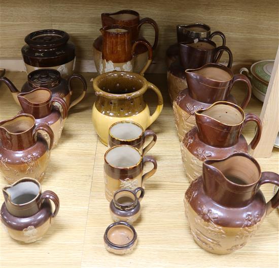 A large collection of 19th century stoneware harvest jugs, etc.